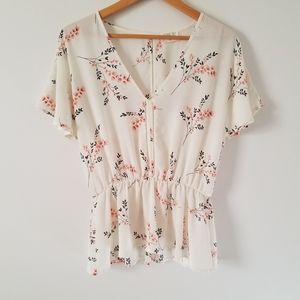 Floral flutter sleeve peplum blouse